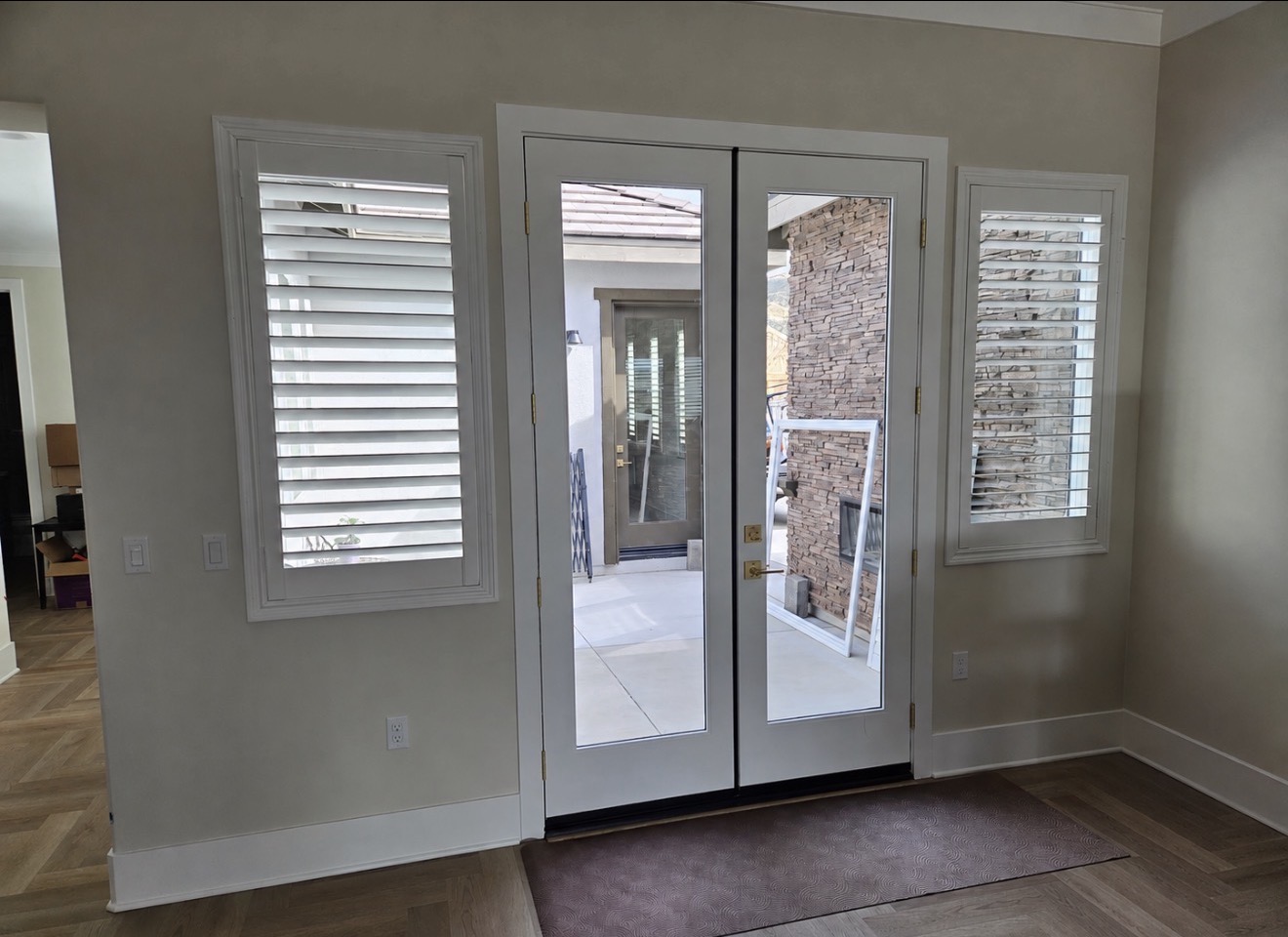 White shutters with French doors